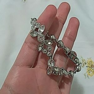 a givency bracelet and necklace